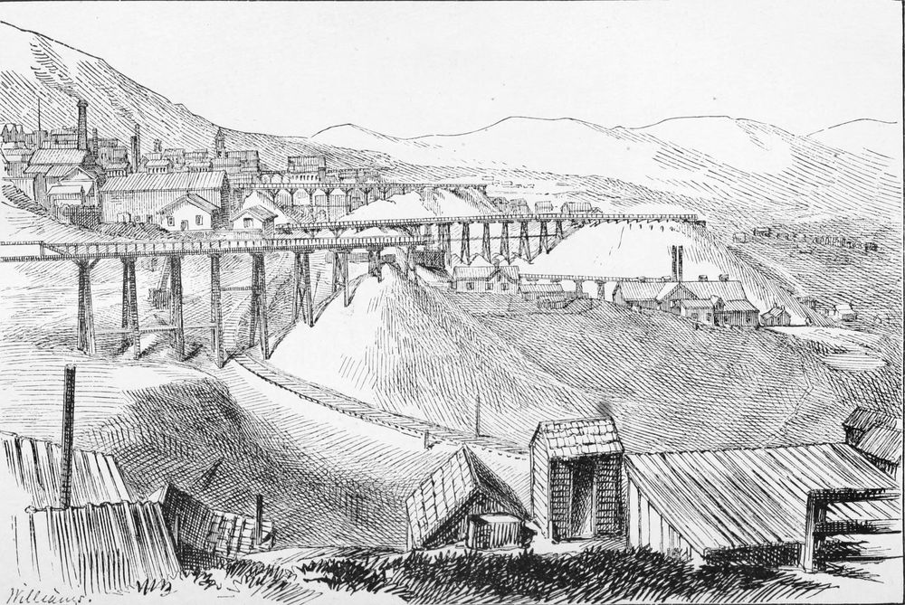 Bare hillsides heaped with mounds of waste rock, crossed by long wooden trestles; mine buildings and smokestacks stand along the top of the ridge.